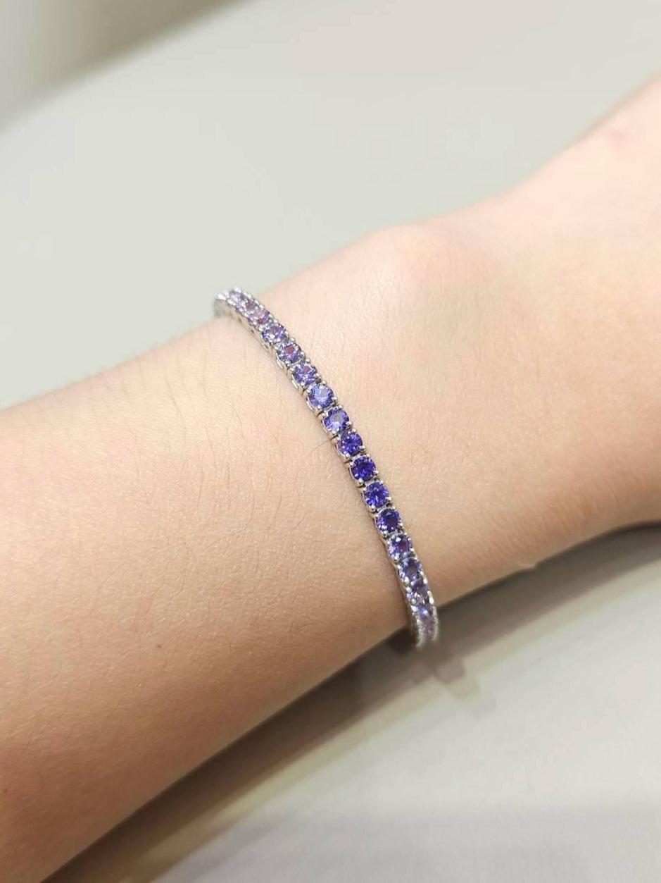 Round Cut Blue Sapphire Ombré Tennis Bracelet with gradient blue sapphires by S.Diamond