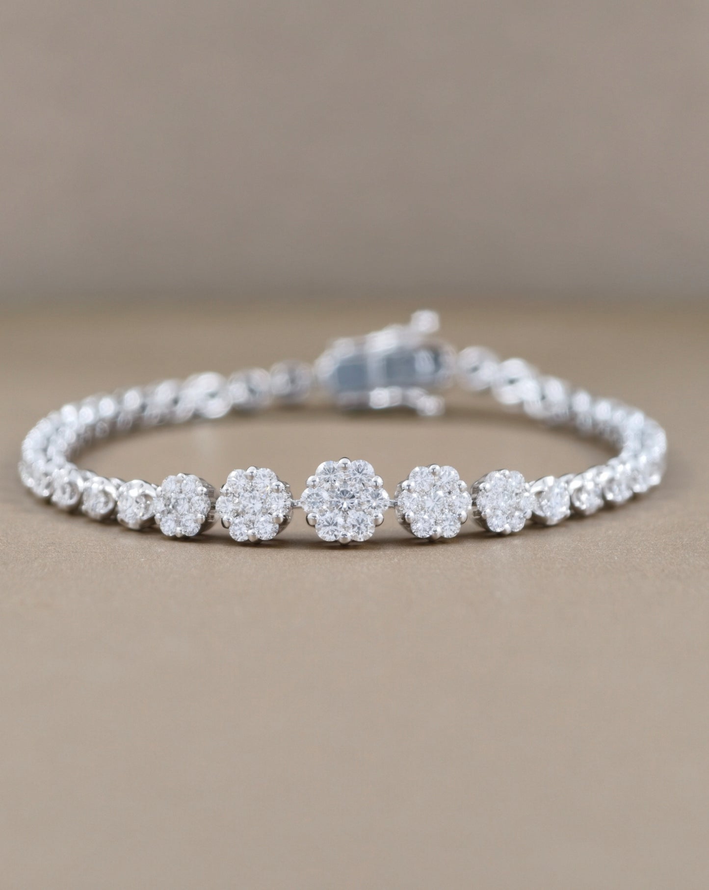 Round Cut diamond cluster bracelet with floral diamond setting in white gold