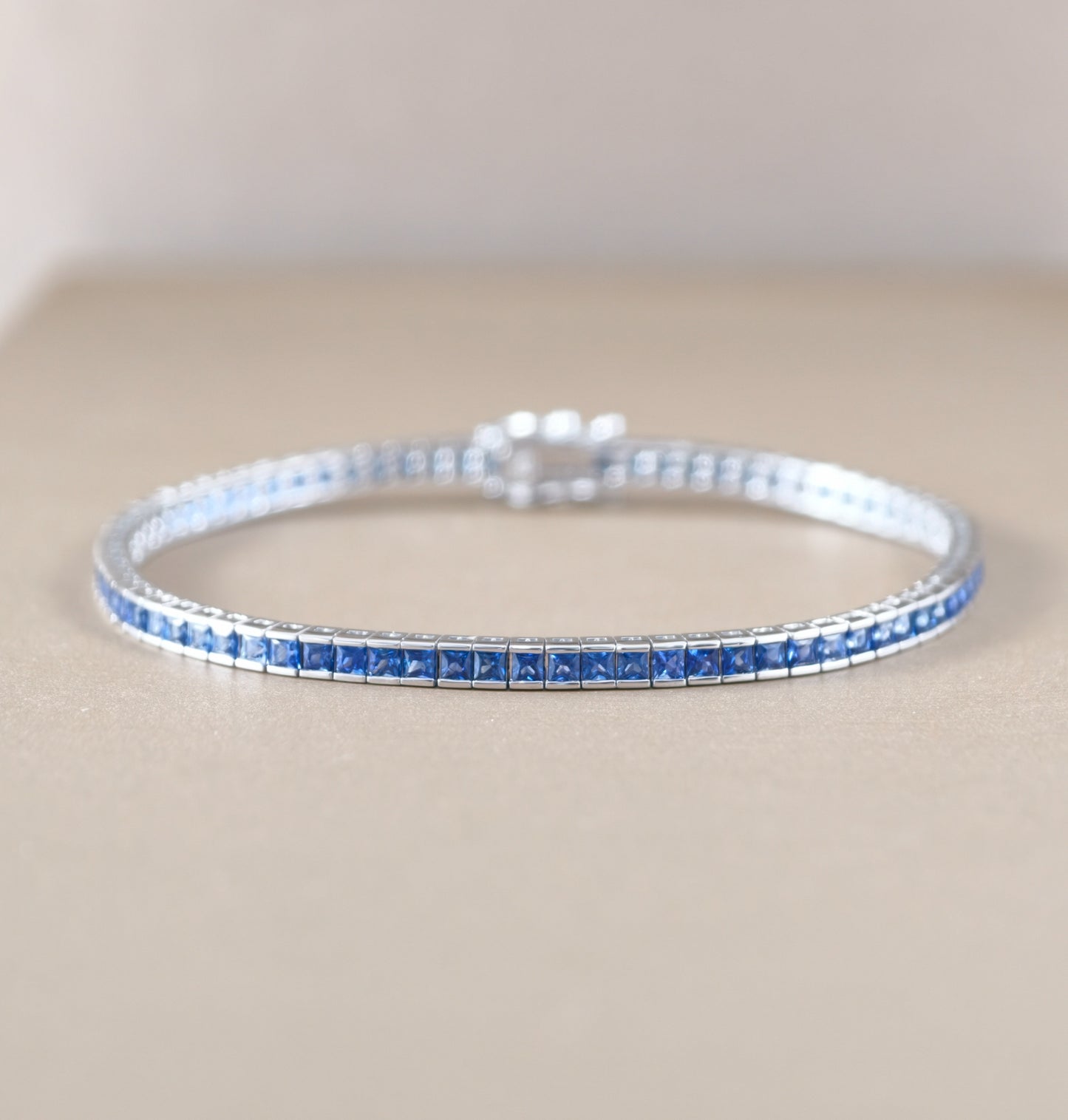 Princess cut blue sapphire tennis bracelet
