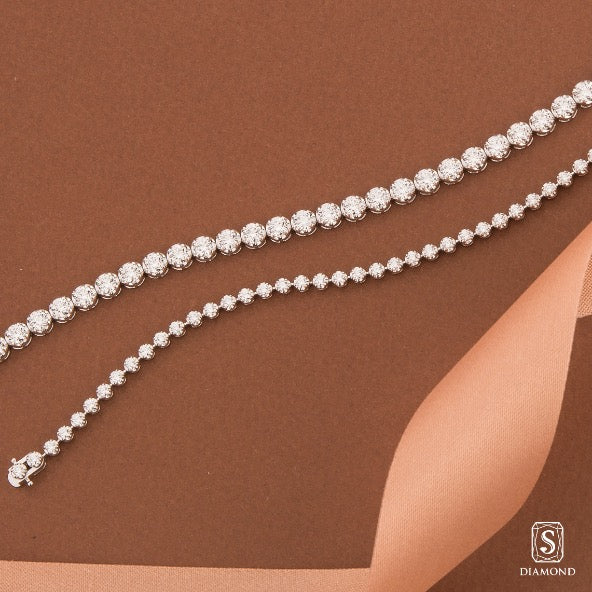 Brilliant classic single-row diamond tennis bracelets stack in bold and delicate petite sizes by S.Diamond