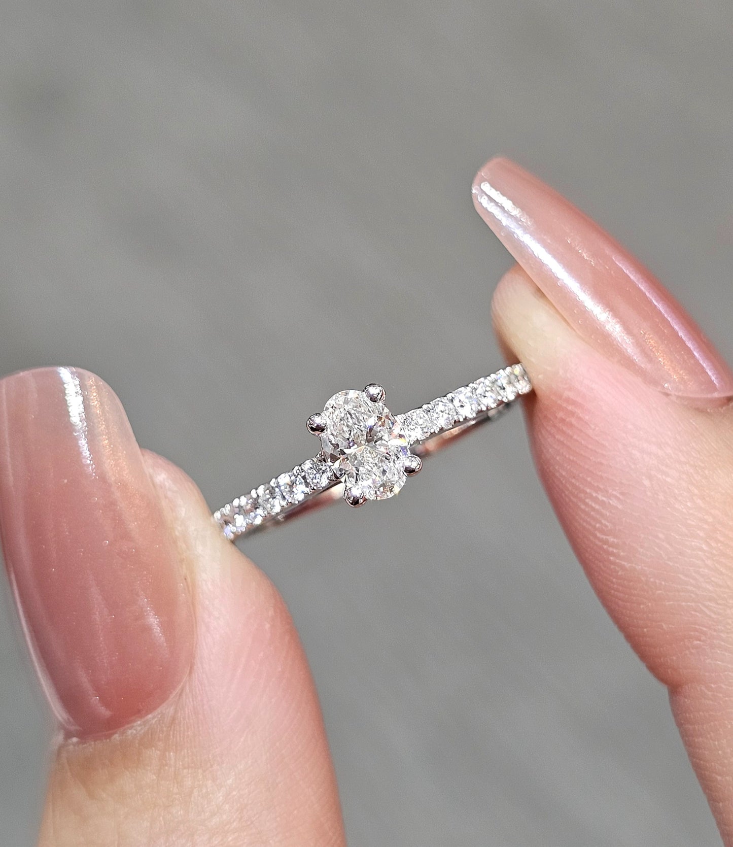 Oval Cut diamond engagement ring with pavé diamond band close-up by S.Diamond
