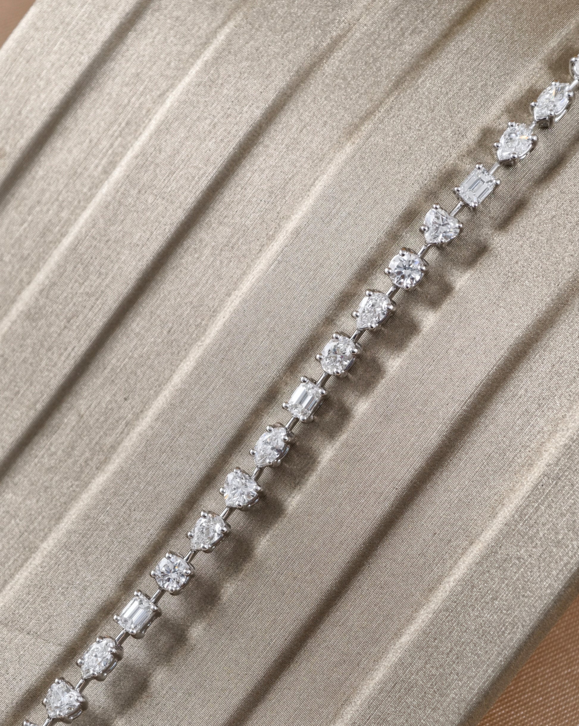 Fancy shape natural diamond tennis bracelet with Round Pear Emerald Oval and Heart Cut diamonds by S.Diamond Bangkok