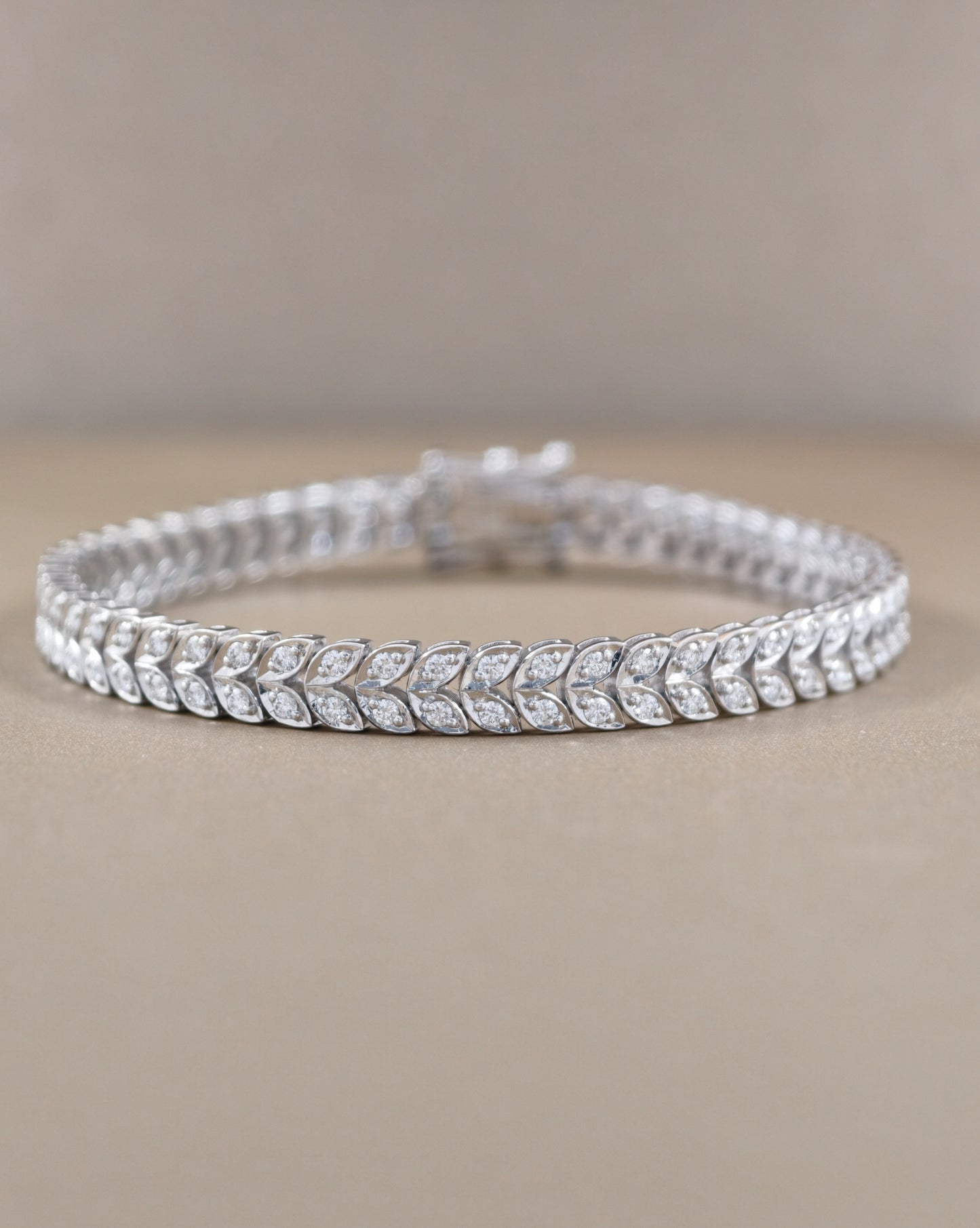 Natural Marquise diamond tennis bracelet with continuous leaf pattern by S.Diamond