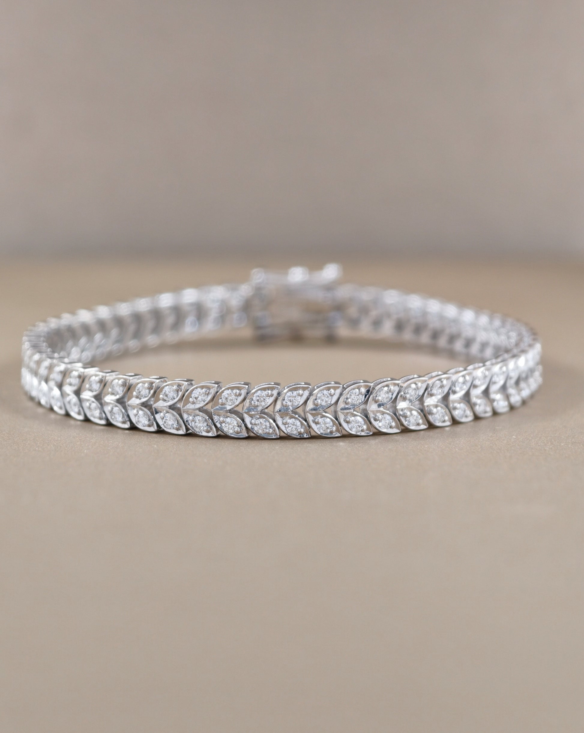 Natural Marquise diamond tennis bracelet with continuous leaf pattern by S.Diamond