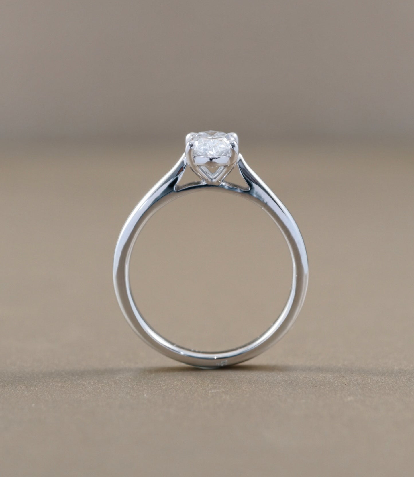 Side profile of Oval Cut natural diamond solitaire engagement ring by S.Diamond Bangkok
