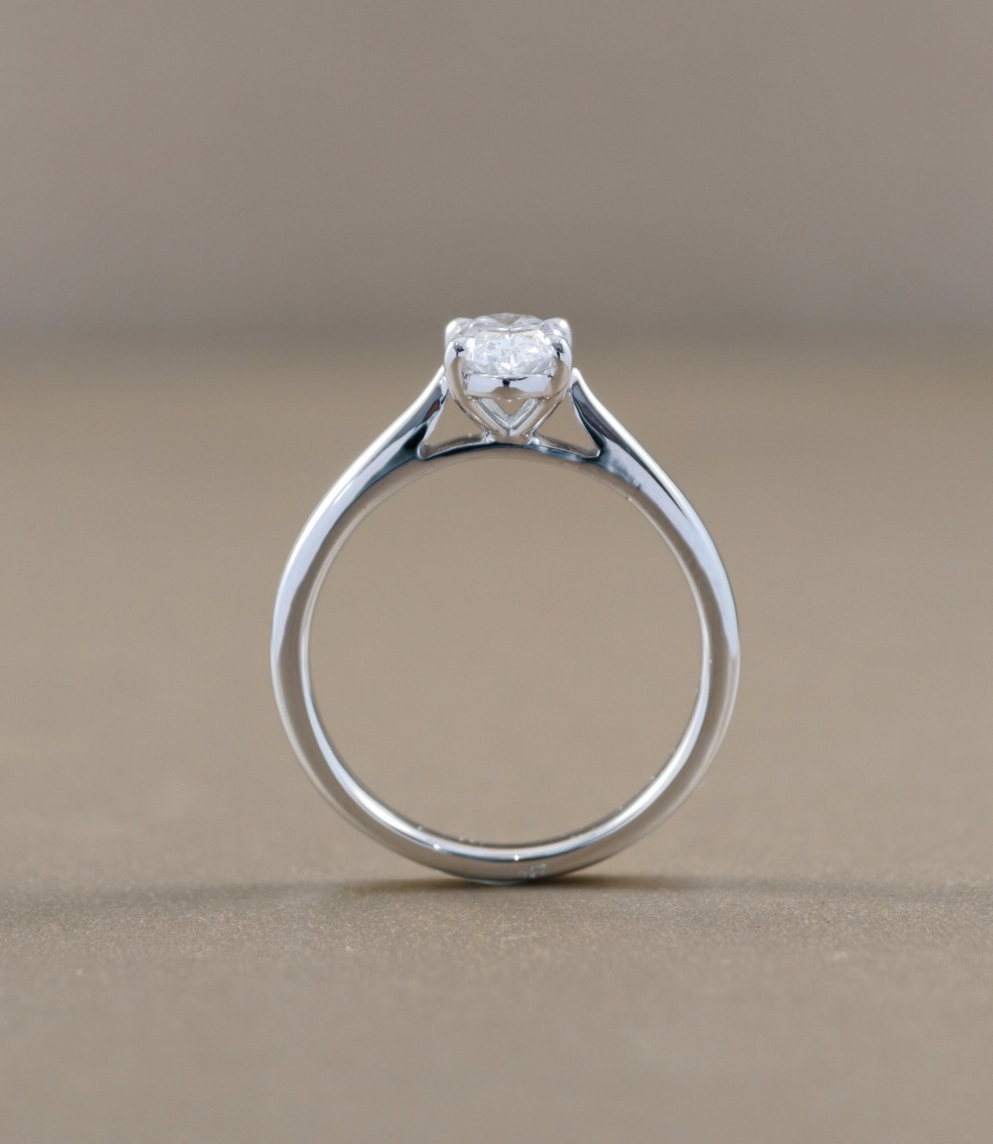 Side profile of Oval Cut natural diamond solitaire engagement ring by S.Diamond Bangkok