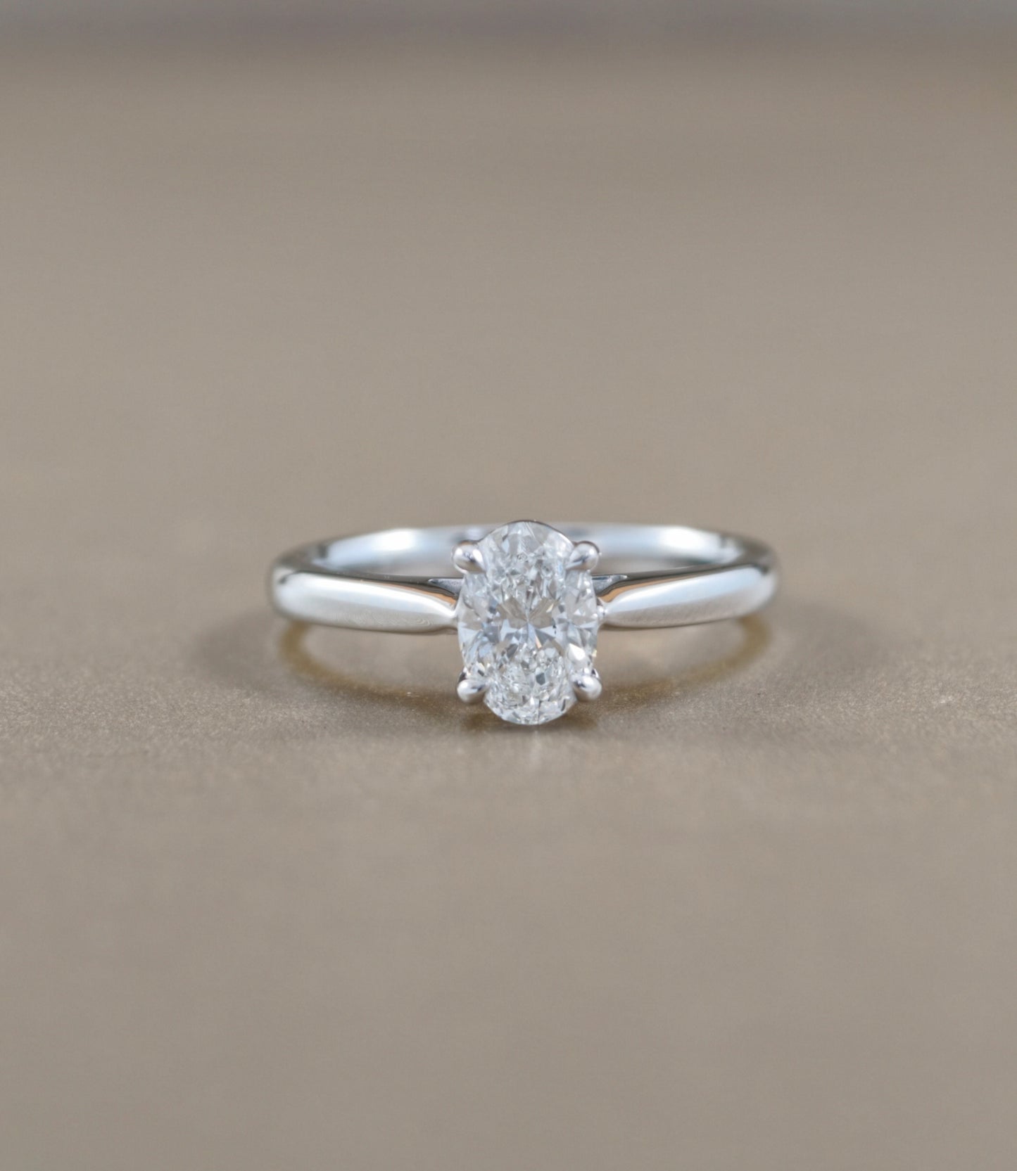 Oval Cut natural diamond solitaire engagement ring with polished white gold band by S.Diamond Bangkok