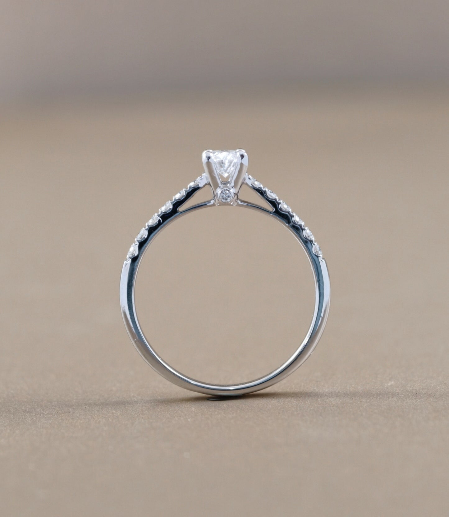 Side profile of Oval Cut natural diamond pavé engagement ring by S.Diamond Bangkok
