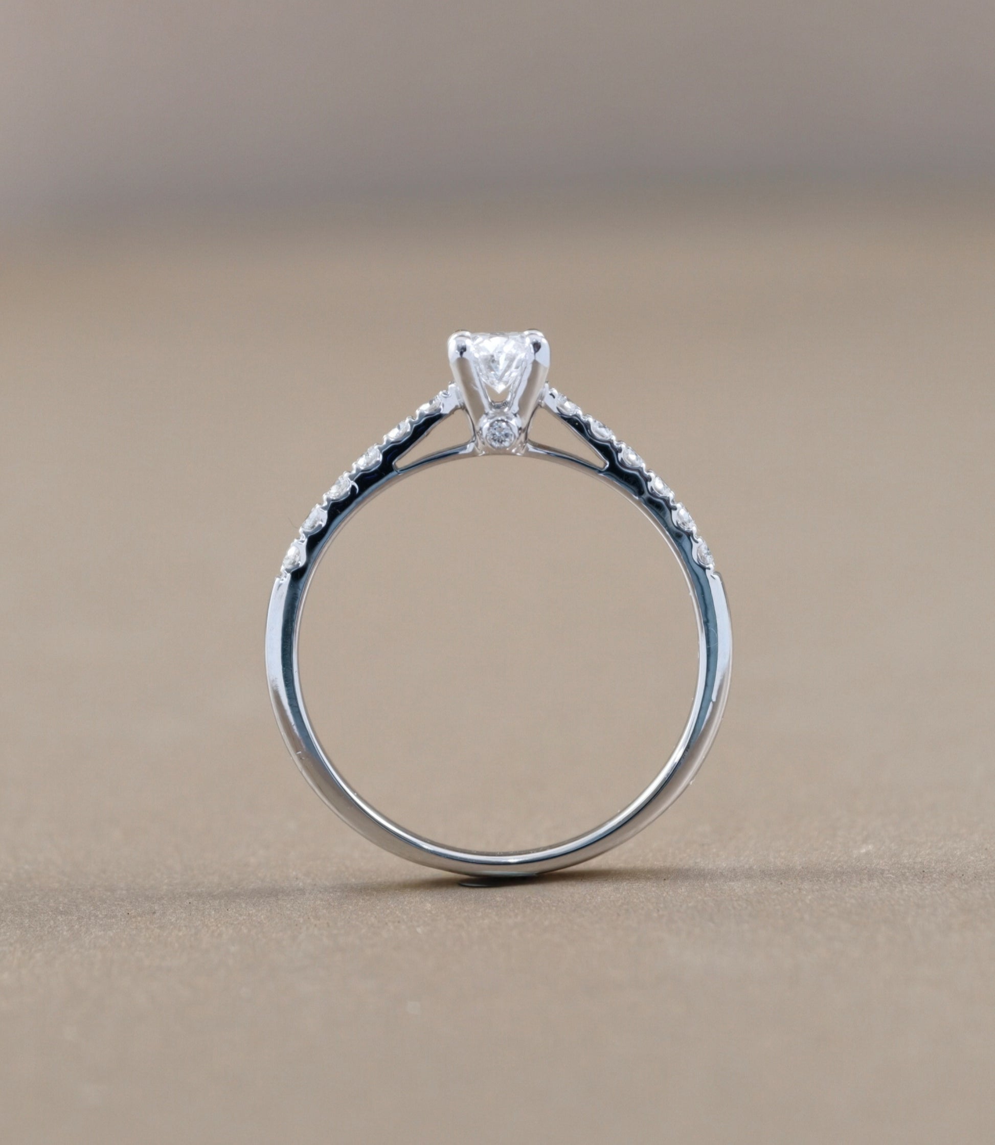 Side profile of Oval Cut natural diamond pavé engagement ring by S.Diamond Bangkok