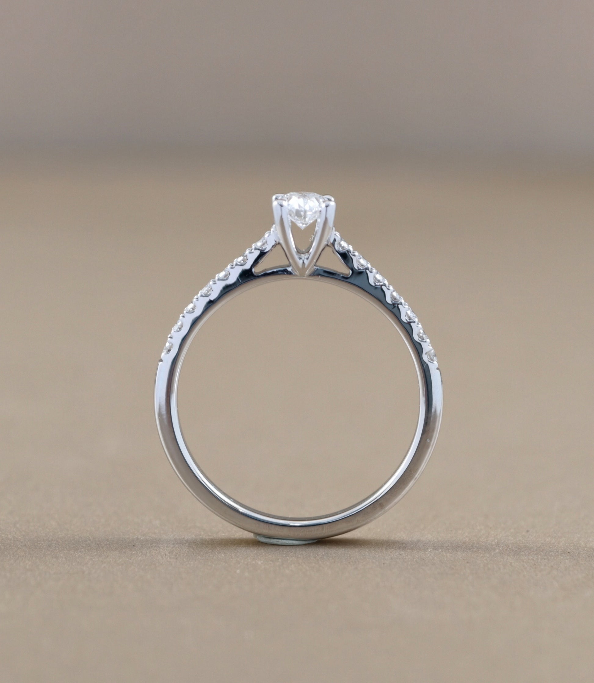 Side profile Oval Cut diamond Cathedral Pavé engagement ring by S.Diamond