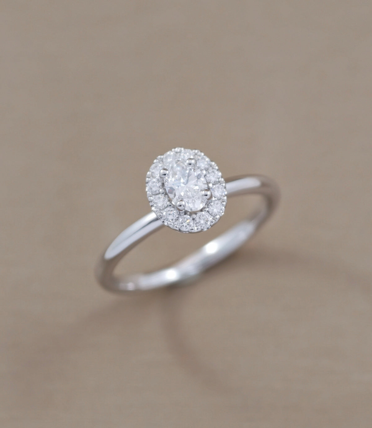 OVAL cut halo engagement ring 
