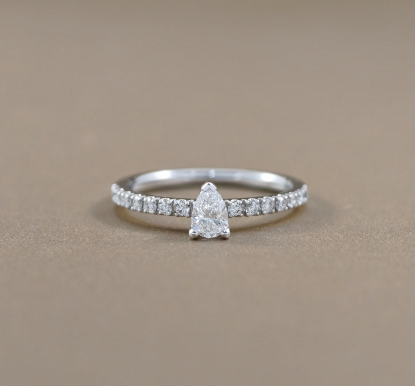 Pear Cut natural diamond classic pavé solitaire engagement ring in white gold by S.Diamond Bangkok