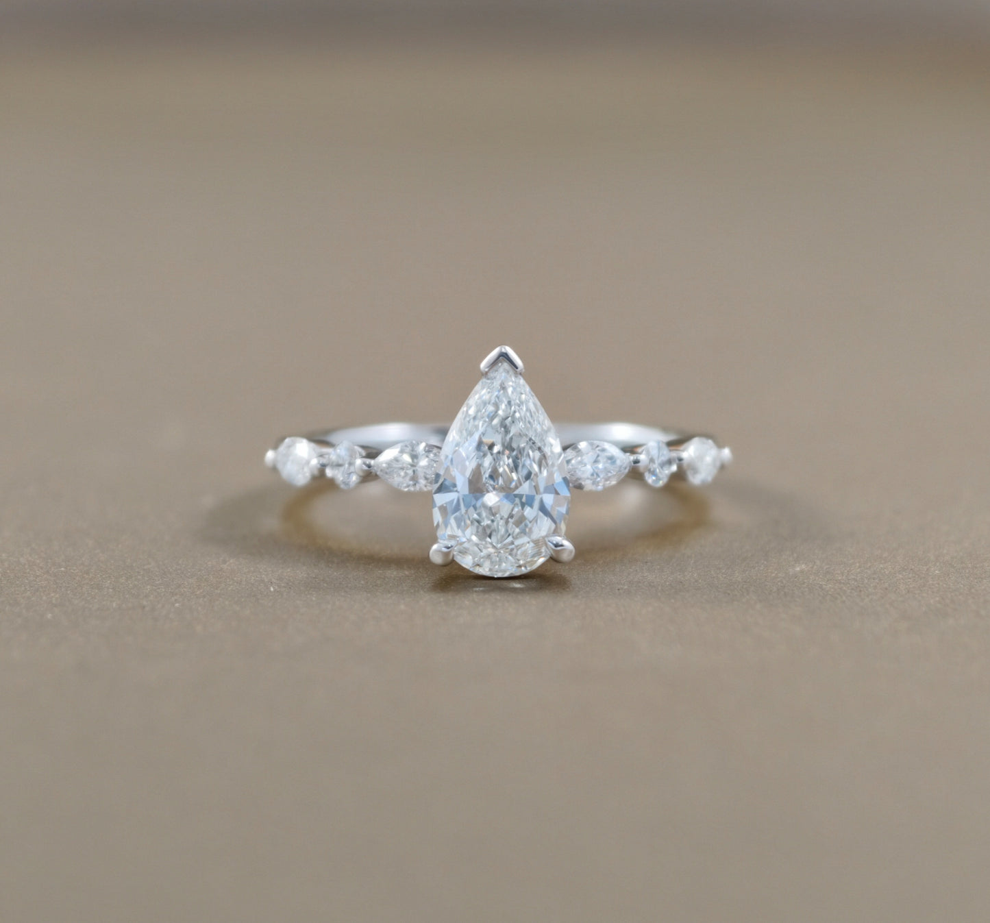 Pear Cut natural diamond engagement ring with graduated Marquise side diamonds by S.Diamond Bangkok