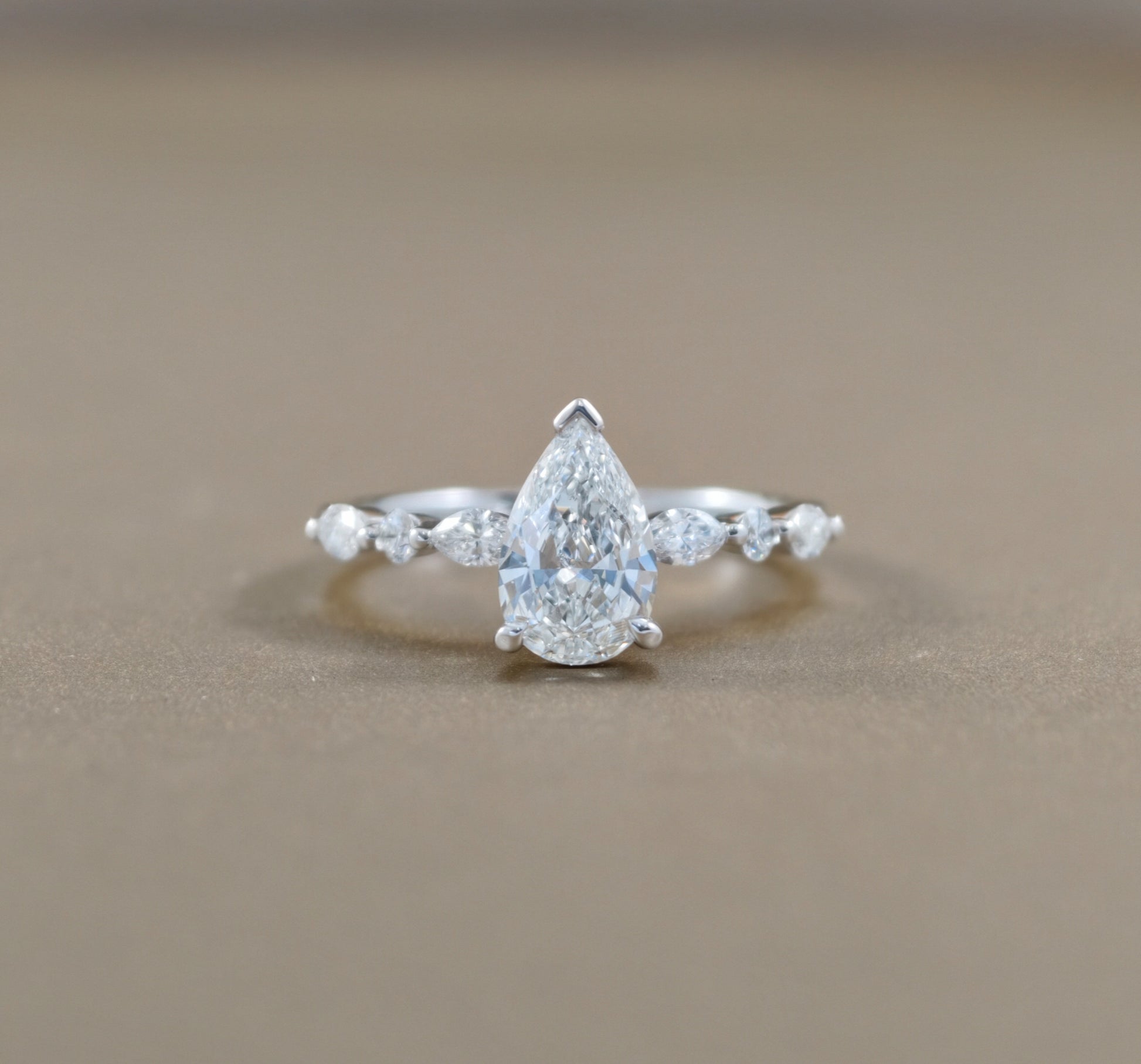 Pear Cut natural diamond engagement ring with graduated Marquise side diamonds by S.Diamond Bangkok
