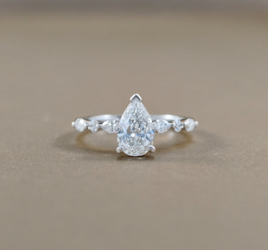 Pear Cut natural diamond engagement ring with graduated Marquise side diamonds by S.Diamond Bangkok