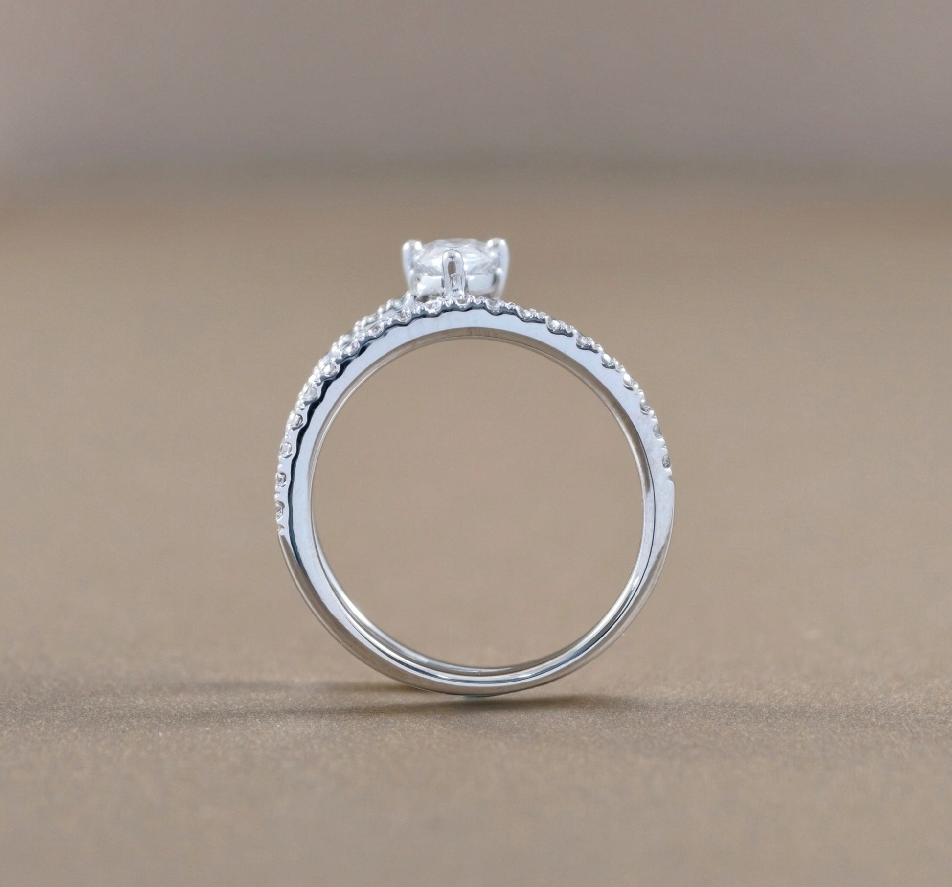 Side profile Pear Cut natural diamond pavé engagement ring by S.Diamond