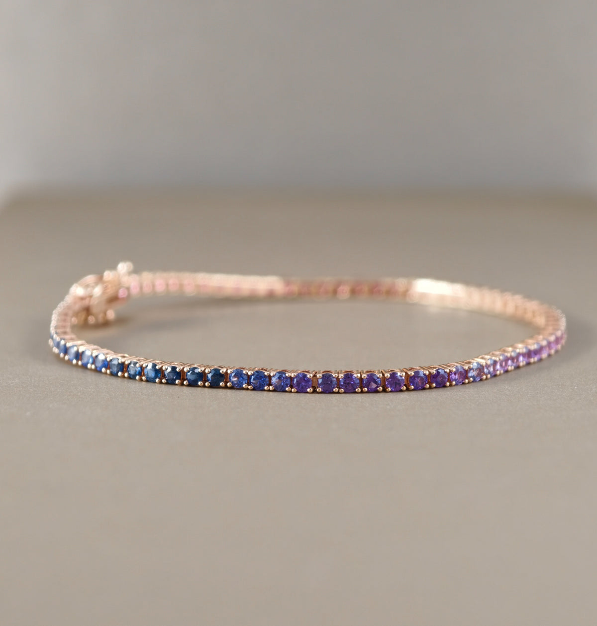 Pink to Blue Sapphire Ombré Tennis Bracelet with pink purple and blue sapphires by S.Diamond