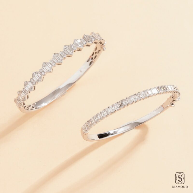 Modern geometric baguette diamond bangle and sleek single-row baguette bracelet stack by S.Diamond