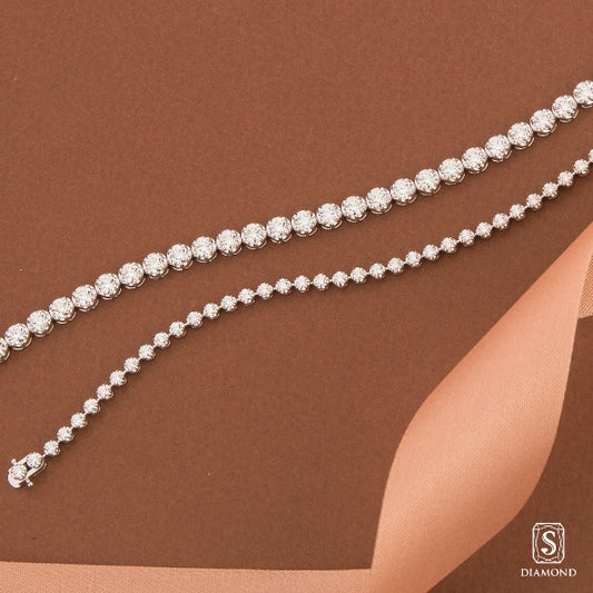 Brilliant classic single-row diamond tennis bracelets stack in bold and delicate petite sizes by S.Diamond