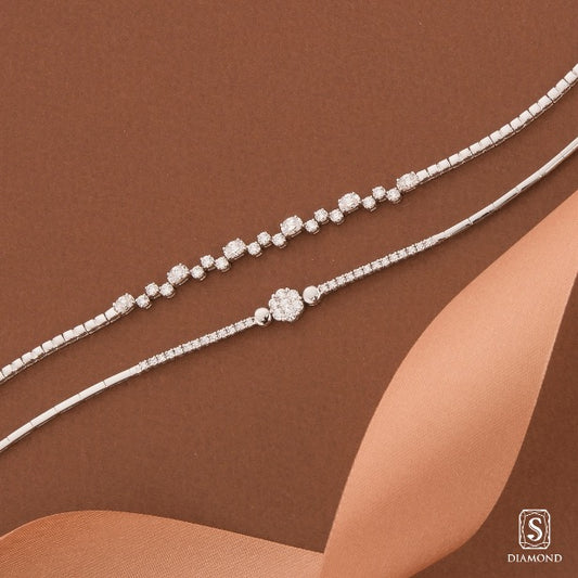 Charming oval shape diamond tennis bracelet and luxury multi-row illusion-set diamond bracelet stack by S.Diamond