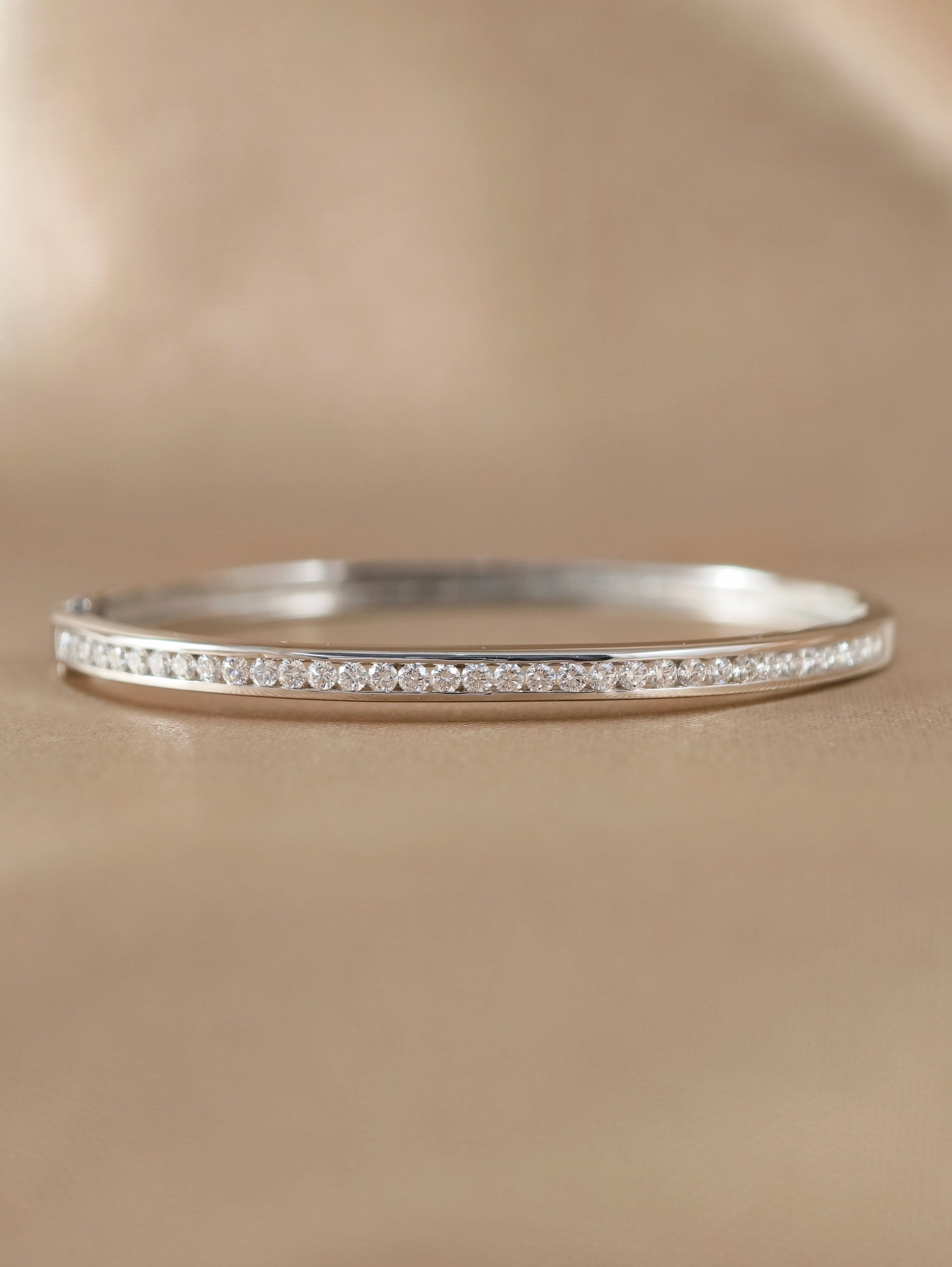 Linéa Natural Diamond Channel Set Bangle in 18K White Gold by S.Diamond Bangkok Thailand