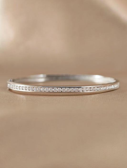 Linéa Natural Diamond Channel Set Bangle in 18K White Gold by S.Diamond Bangkok Thailand