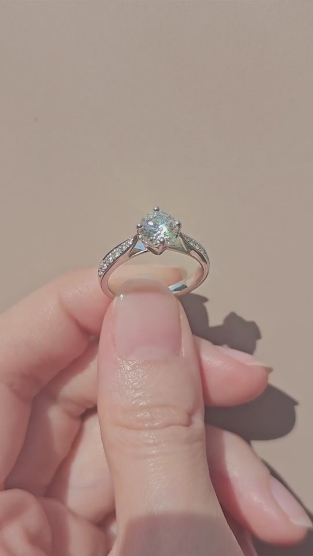  VDO round brilliant natural diamond engagement ring on hand