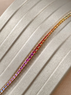 Gradation Rainbow Sapphire Tennis Bracelet with pink red orange and multicolor sapphires by S.Diamond